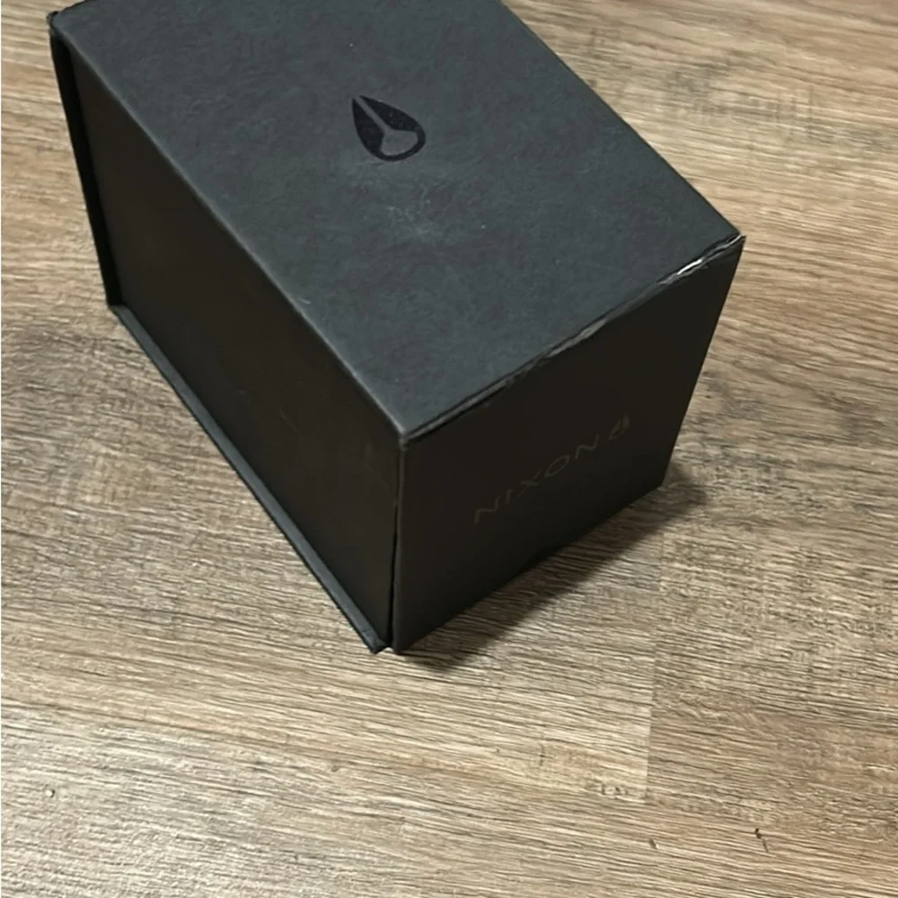 Nixon Black and Gold Men's Watch